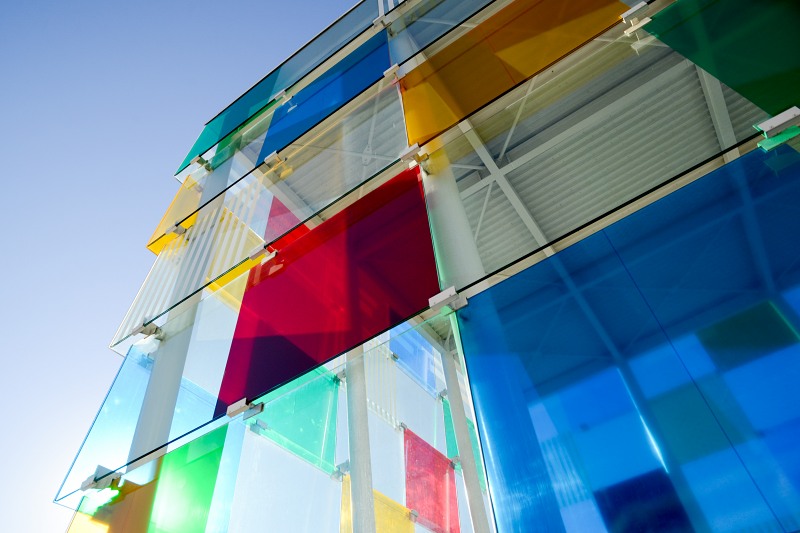 Modern colorfull glass cube building free photo