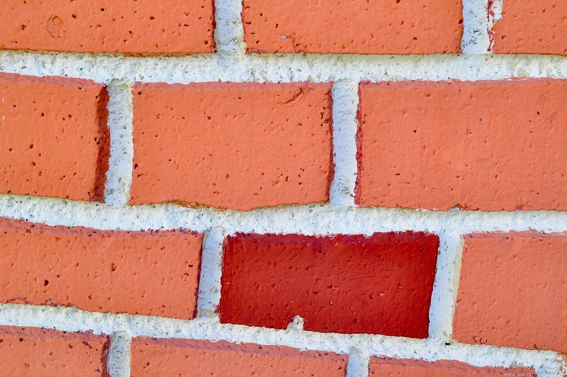 Irregular bricks wall free photo