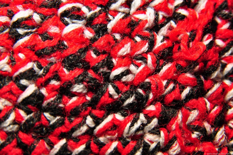 Red and white knitted material free photo