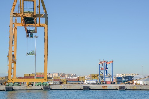 Large maritime crane on docks free photo