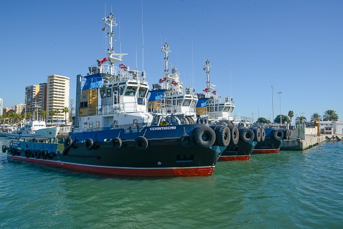 Tug boats in tropical port