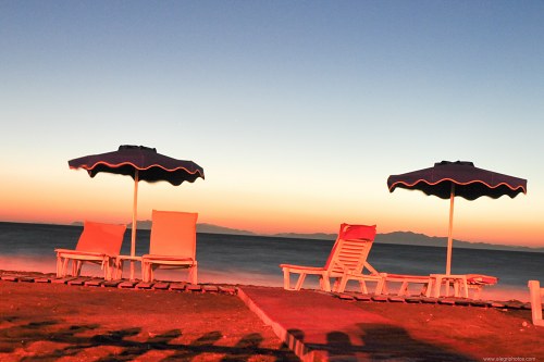 Beach chairs sunset free photo