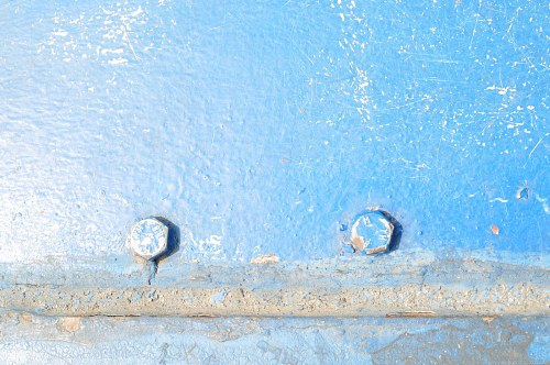 Blue painted metallic bar with  rivets free photo
