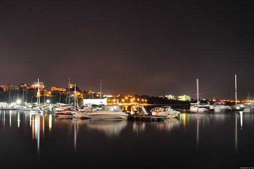 Boats on the docks at night free photo