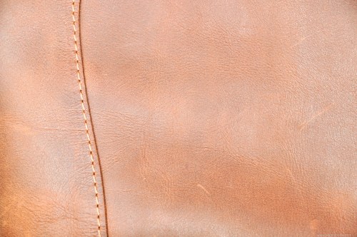 Brown leather with sewing texture free photo