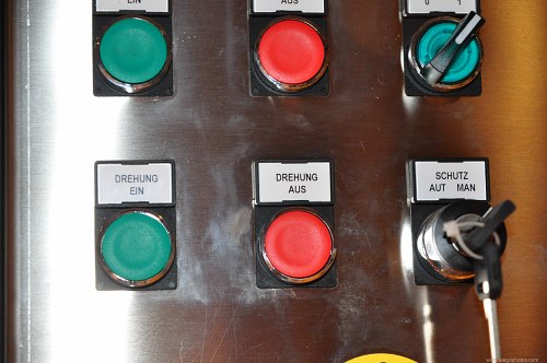 Buttons and key on a control panel free photo