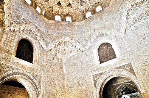 Detailed wall ornaments in Alhambra palace interior free photo