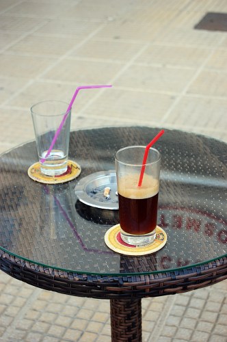 Frappe glass on coffee table  free photo