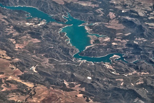Lake and mountains seen from aircraft free photo