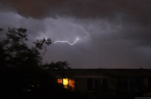 Lightning above building free photo