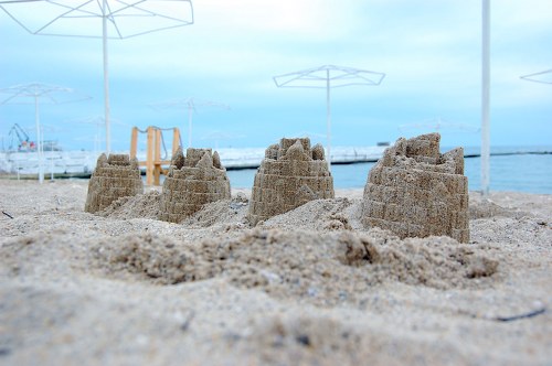 Sand castles on beach free photo